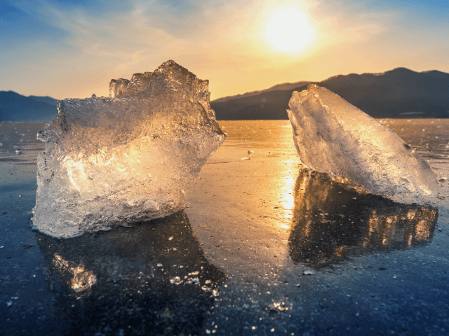 very-large-beautiful-chunk-ice-sunrise-winter