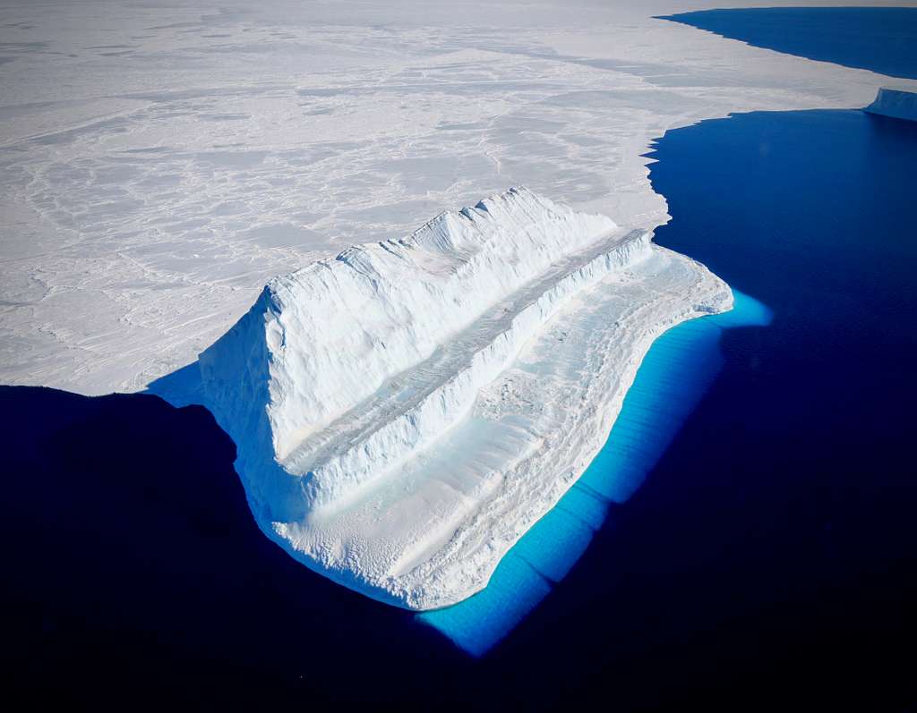McMurdo Iceberg, a massive iceberg that broke from the Ross Ice Shelf in 2000 and, for years, blocked shipping lanes and impacted penguin populations near McMurdo Station, Antarctica. Image: NASA